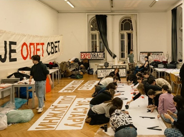 Inside the occupation - Banner on the wall says "Belgrade is again the world" 