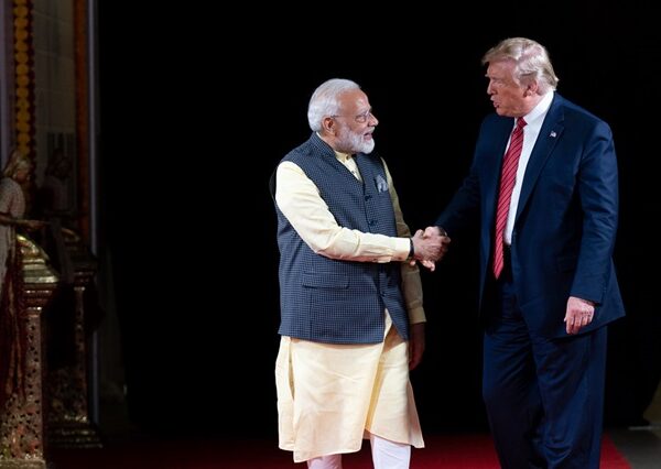 Modi and Trump meet with handshake