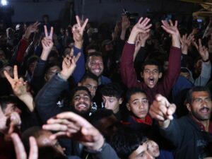 Palestinians celebrate the ceasefire