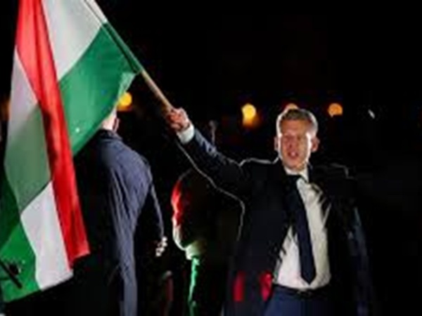 Peter Magyar waving flag